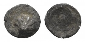 Calabria, Tarentum Hexante or Sixth of litra circa 480-470, AR 5mm., 0.07g. Shell. Rev. Wheel with four spokes. Vlasto 1118. Historia Numorum Italy 83...