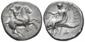 Calabria, Tarentum Nomos circa 315-305, AR 21mm., 7.60g. Warrior, preparing to cast spear held in r. hand, holding two spears and shield in l., on hor...