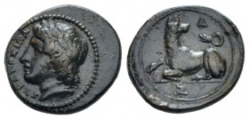 Sicily, Agathokles, 317-289. Syracuse Bronze circa 317-310, Æ 13.4mm., 1.76g. Laureate head of Apollo l. Rev. Hound lying l., head r. Calciati 149. BA...