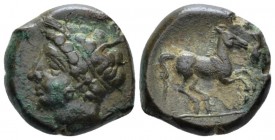 The Carthaginians in Sicily and North Africa, uncertain mint Bronze second half of IV cent., Æ 20mm., 6.37g. Wreathed head of Tanit l. Rev. Horse gall...