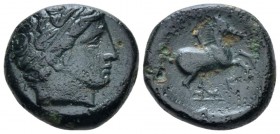 Kingdom of Macedon, Philip II, 359 – 336 Uncertain mint Bronze circa 359-336, Æ 18.2mm., 18.1g. Diaemded head of Apollo r. Rev. Horseman advancing r. ...