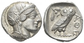 Attica, Athens Tetradrachm circa 440-430, AR 24mm., 17.25g. Head of Athena r., wearing crested helmet, earring and necklace; bowl ornamented with spir...