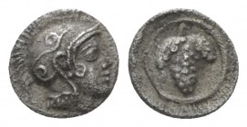 Cilicia, Soloi Hemiobol circa 400-350, AR 7mm., 0.22g. Helmeted hef of Athena r. Rev. Bunch of grapes. SNG Levante cf. 48.

Extremely Fine.