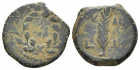 Judaea, Valerius Gratus, 15-26. Jerusalem Prutah circa 24-25 (year 11 of Tiberius), Æ 15.8mm., 2.34g. TIB KAI CAP Within wreath. Rev. IOY ΛIA Palm bra...