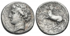 Apulia, Dazos, magistrate(?) Arpi Didrachm circa 325-275, AR 21.4mm., 6.11g. Wreathed head of Demeter l.; behind, kantharos. Rev. Horse prancing l.; a...