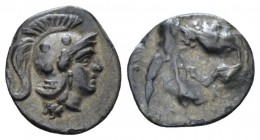 Calabria, Tarentum Diobol circa 325-280, AR 12mm., 1.02g. Head of Athena r., wearing Attic helmet decorated with circles. Rev. Herakles standing r., s...