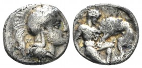 Calabria, Tarentum Diobol circa 325-280, AR 11mm., 1.16g. Head of Athena r., wearing Attic helmet. Rev. Herakles knelling r., strangling Nemean lion. ...