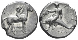 Calabria, Tarentum Nomos circa 281-270, AR 21mm., 7.86g. Youth on horseback r., crowning his horse. Rev. Oecist riding dolphin l., holding bunch of gr...