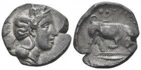 Lucania, Thurium Nomos circa 410-400, AR 23mm., 7.21g. Head of Athena r., wearing Attic helmet decorated with Skylla. Rev. Bull butting r.; in exergue...