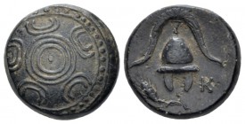 Kingdom of Macedon, Philip III Arridaeus, 323-317 Milteus or Mylasa Bronze circa 323-317, Æ 15mm., 4.46g. Macedonian shield. Rev. Helmet; at sides, ba...
