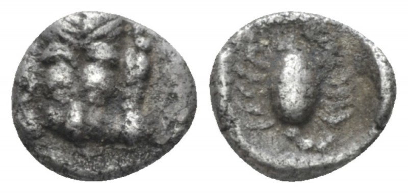 Caria, Mylasa Obol circa 450-400, AR 6mm., 0.47g. Facing head of lion. Rev. Scor...