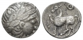Celtic, Eastern Celts, Danube region and Balkans. Drachm III cent., AR 13.80 mm., 2.33 g.
Laureate head of Zeus r. Rev. Horse advancing l., above, an...