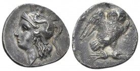 Calabria, Tarentum Drachm circa 280-272, AR 20.00 mm., 3.08 g.
Head of Athena l., wearing Attic helmet, decorated with Scylla. Rev. Owl standing r., ...