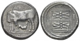 Illyricum, Dyrrachium Stater circa 450-350, AR 22.00 mm., 10.79 g.
Cow suckling calf, head reverted. Rev. Floral pattern within linear square; in exe...