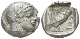 Attica, Athens Tetradrachm circa 450-445 BC, AR 25.00 mm., 17.15 g.
Head of Athena r., wearing crested Attic helmet with three olive leaves over viso...