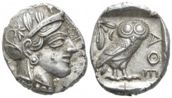 Attica, Athens Tetradrachm circa 450, AR 23.30 mm., 17.29 g.
Head of Athena r., wearing Attic helmet decorated with olive wreath and palmette. Rev. O...