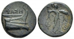 Lycia, Phaselis Bronze circa 221/0-190, Æ 16.70 mm., 5.57 g.
Prow of galley r. Rev. Athena standing r., wielding thunderbolt and aegis; monogram to l...