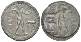 Bruttium, Caulonia Nomos circa 525-500 BC, AR 27.50 mm., 7.14 g.
 Apollo, diademed, walking r., holding laurel branch in upraised r. hand and small r...