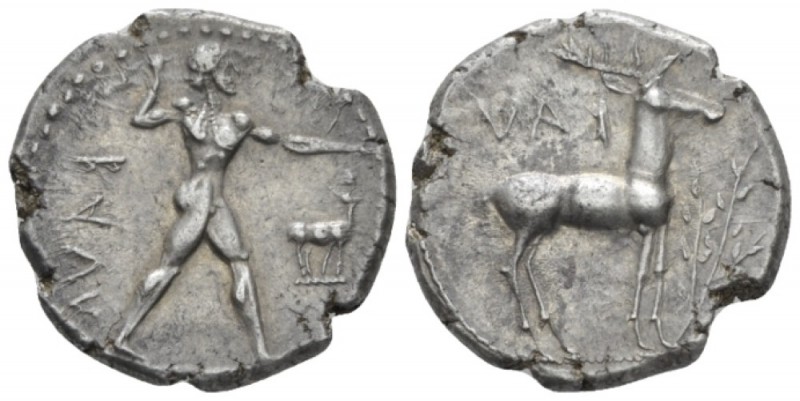 Bruttium, Caulonia Stater circa 450, AR 22.20 mm., 8.16 g.
 Naked Apollo standi...