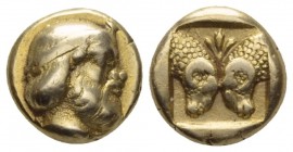 Lesbos, Mytilene Hecte circa 450, EL 10.70 mm., 2.52 g.
Diademed head of a Satyr r., with full beard and goat's ear. Rev. Heads of two confronted ram...