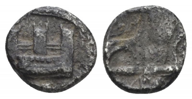 Phoenicia, Sidon Obol circa 410-400, AR 8.00 mm., 0.60 g.
City wall. Rev. Arche...