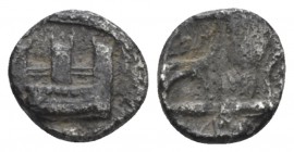 Phoenicia, Sidon Obol circa 410-400, AR 8.00 mm., 0.60 g.
City wall. Rev. Archer advancing r. Betlyon, A new Chronology for the Pre-Alexandrine Coina...