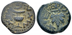 Judaea, Jewish War, 66-70 Jerusalem Prutah circa 67-68 (year 2), Æ 11.70 mm., 2.85 g.
Amphora. Rev. Vine leaf on branch with tendril. Meshorer 196. H...