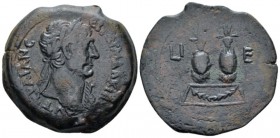 Egypt, Alexandria Trajan, 98-117 Drachm circa 111-112 (year 15), Æ 34.20 mm., 22.59 g.
Laureate bust r., wearing aegis. Rev. Two canopi set on basis;...
