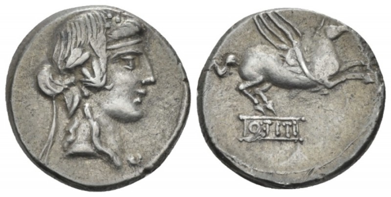 Q. Titius. Denarius circa 90, AR 17.00 mm., 4.00 g.
Head of Liber r., wearing i...