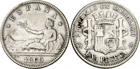 1869*--69. Gobierno Provisional. SNM. 1 peseta. (AC. 17). ESPAÑA. Muy escasa. 4,80 g. MBC-.