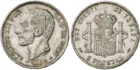 1883*1883. Alfonso XII. PGM. 5 pesetas. (Barrera 1228). Falsa de época de ensayador imposible. 24,51 g. MBC-.