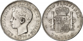 1897. Alfonso XIII. Manila. SGV. 1 peso. (AC. 122). Golpecitos. 25,24 g. MBC-.