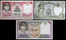 Nepal. s/d. Banco Central. 2, 5 y 10 rupias. (Pick 23, 24 y 29). Birendra Bir Bikeram. 3 billetes. S/C-.