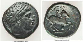 MACEDONIAN KINGDOM. Philip II (359-336 BC). AE unit (18mm, 6.25 gm, 4h). Choice Fine. Uncertain mint in Macedonia. Head of Apollo right, wearing taeni...