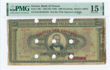 GREECE: 1000 Drachmas (15.10.1926) of 1941 Emergency re-issue cancelled banknote with nine large cancellation holes. S/N: "ΚΞ100 004849". Signature by...