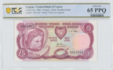 CYPRUS: 5 Pounds (1.10.1990) in violet on multicolor unpt with limestone head from Hellenistic period at left. S/N: "N 917242". WMK: Moufflon head. Pr...