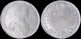 AUSTRIA: 1 Thaler (1764) in silver (0,833) with mature armored bust of Maria Theresa facing right. Crowned imperial double-headed eagle with crowned a...