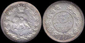 IRAN: 1/4 Kran [AH1332 (1913)] in silver (0,900) with legend within circle and wreath. Radiant lion holding sword within crowned wreath on reverse. In...