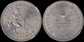 PHILIPPINES / U.S. ADMINISTRATION: 5 Centavos (1904) in copper-nickel with man seated beside hammer and anvil. Eagle above stars and striped shield on...