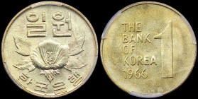 SOUTH KOREA: 1 Won (1966) in brass with rose of Sharon. Inscription, value and date on reverse. Inside slab by PCGS "MS 62". Cert number: 43476643. (K...