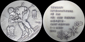 FRANCE: Silver medal for the five nations international ski tournament that took place on 1-4 of March 1964 in Megeve. Skiers on oberse. Legend in Fre...