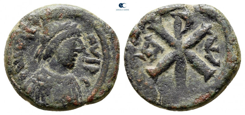 Justin I AD 518-527. Constantinople
Pentanummium Æ

14 mm, 1,96 g



very...