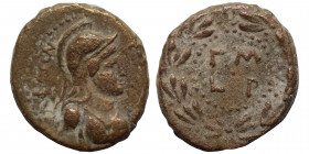 SYRIA. Decapolis. Philadelphia. Time of Titus, 79-81. 1/3 Assarion (bronze, 2.75 g, 16 mm). ΦΙΛΑΔΕΛΦΕΩΝ Helmeted and draped bust of Athena to right. R...
