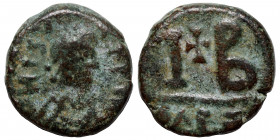 Justin II, 565-578. Dekanummium (bronze, 2.76 g, 15 mm), Alexandria. Diademed, draped and cuirassed bust of Justin II to right. Rev. Cross between I a...