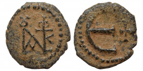 Justin II, 565-578. Pentanummium (bronze, 1.39 g, 14 mm), Theoupolis (Antioch). Monogram of Justin II. Rev. Large Є, cross to right. SB 386. Nearly ve...