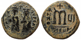 Phocas, with Leontia, 602-610. Follis (bronze, 10.14 g, 28 mm), Theoupolis (Antioch), RY 6 = 607/8. O N FOCA NЄ PЄ AV Phocas standing facing, holding ...