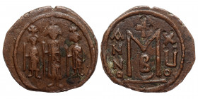 Heraclius, with Martina and Heraclius Constantine, 610-641, or later Arab Byzantine imitation, circa 670-700. Fals (bronze, 5.19 g, 25 mm). Uncertain ...