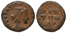 VANDALS (?). Nummus (bronze, 0.43 g, 10 mm). Pearl-diademed and draped bust right, blundered legend around. Rev. VOT MVT (or similar) retrograde. Near...