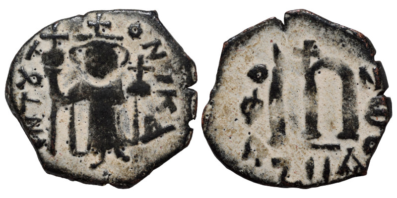 Arab-Byzantine, Umayyad Caliphate, circa AD 641-670. Fals (bronze, 3.95 g, 21 mm...