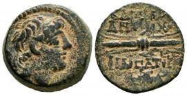 REINO SELEUCIDA, Antiochos IX. Ae18. (Ae. 5,95g/18mm). 114-95 a.C. Antioquía. (HGC 9, 1248). Anv: Cabeza laureada de Antiochos IX a derecha. Rev: Rayo...